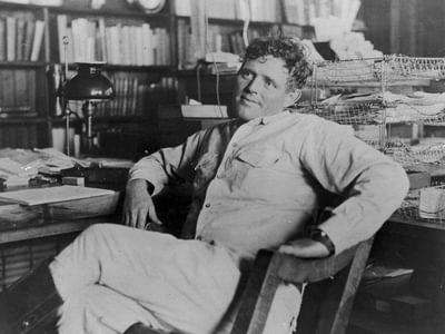 Jack London sitting in a chair