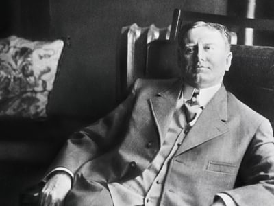 William Sydney Porter AKA O. Henry sitting in a chair