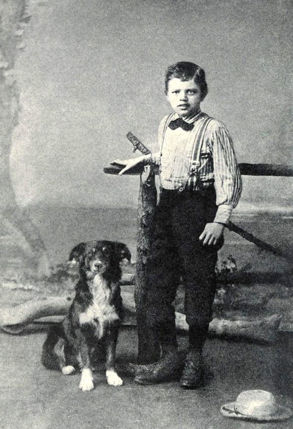 Jack London, 9 years old, with his dog Rollo, 1885.